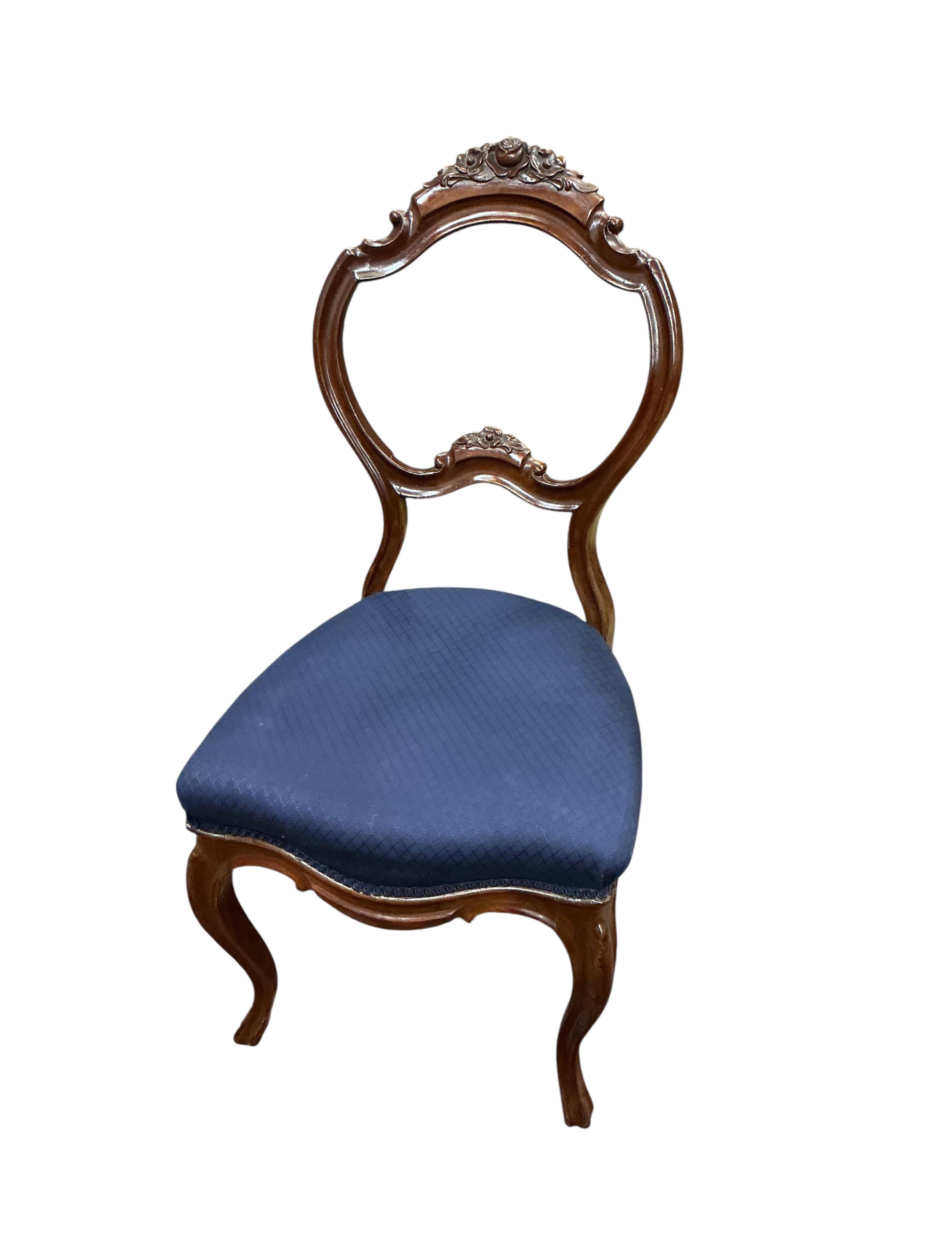 A set of six 19th century French carved mahogany balloon back dining chairs, width 46cm, height 96cm
